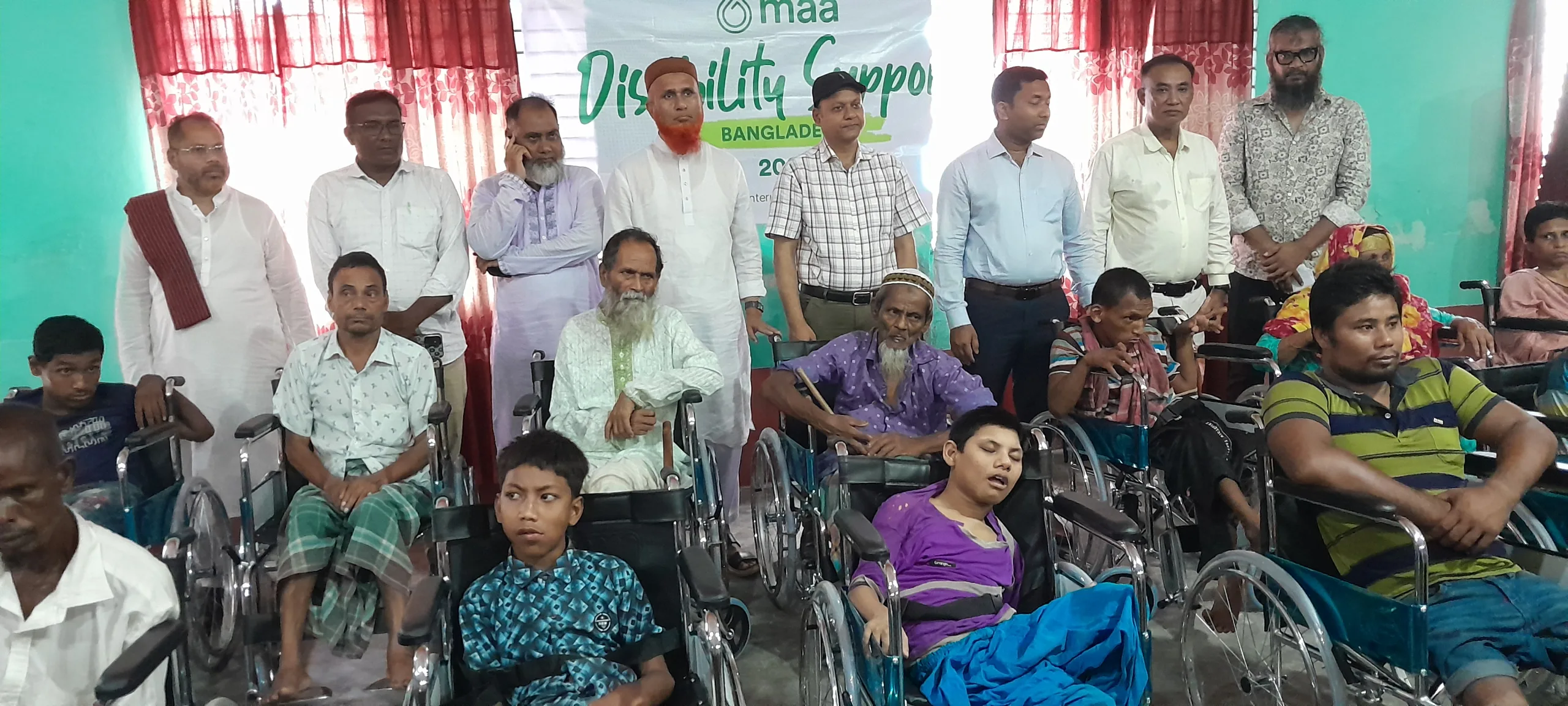 পীরগঞ্জ বাসী কল্যাণ সমিতি ঢাকা এর হুইল চেয়ার বিতরণ