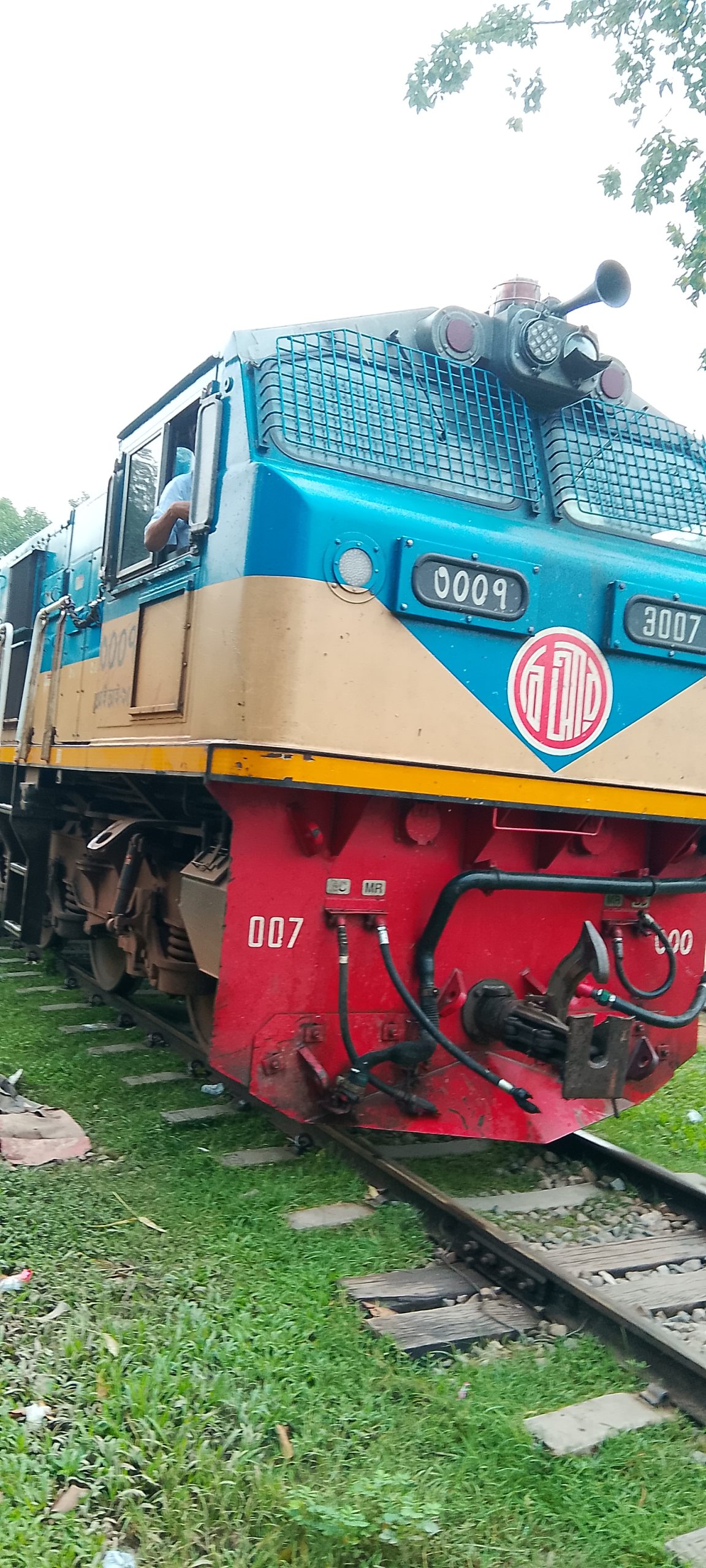 Kalni Express Collides with Tractor at Srimangal Rail Crossing; Driver Injured, Gateman Suspended
